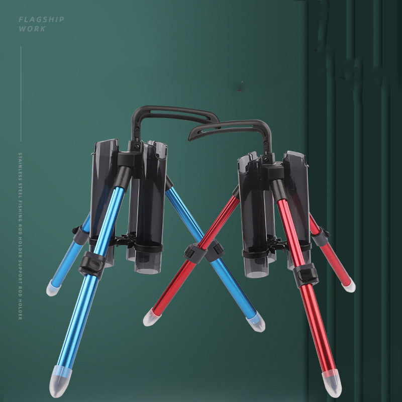 Two tripod stands, one blue and one red, on a green background.